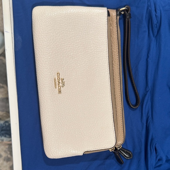 Coach Handbags - Coach Ivory and Tan Leather Wristlet